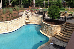 A residential outdoor swimming pool installed by Alpharetta GA Swimming Pool Contractors.