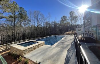 Backyard swimming pool installed by Premier Pool Enterprises