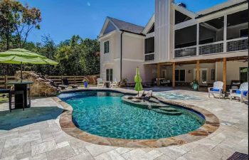 Backyard swimming pool of irregular shape